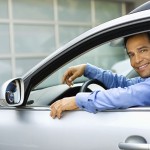 Businessman sitting in car